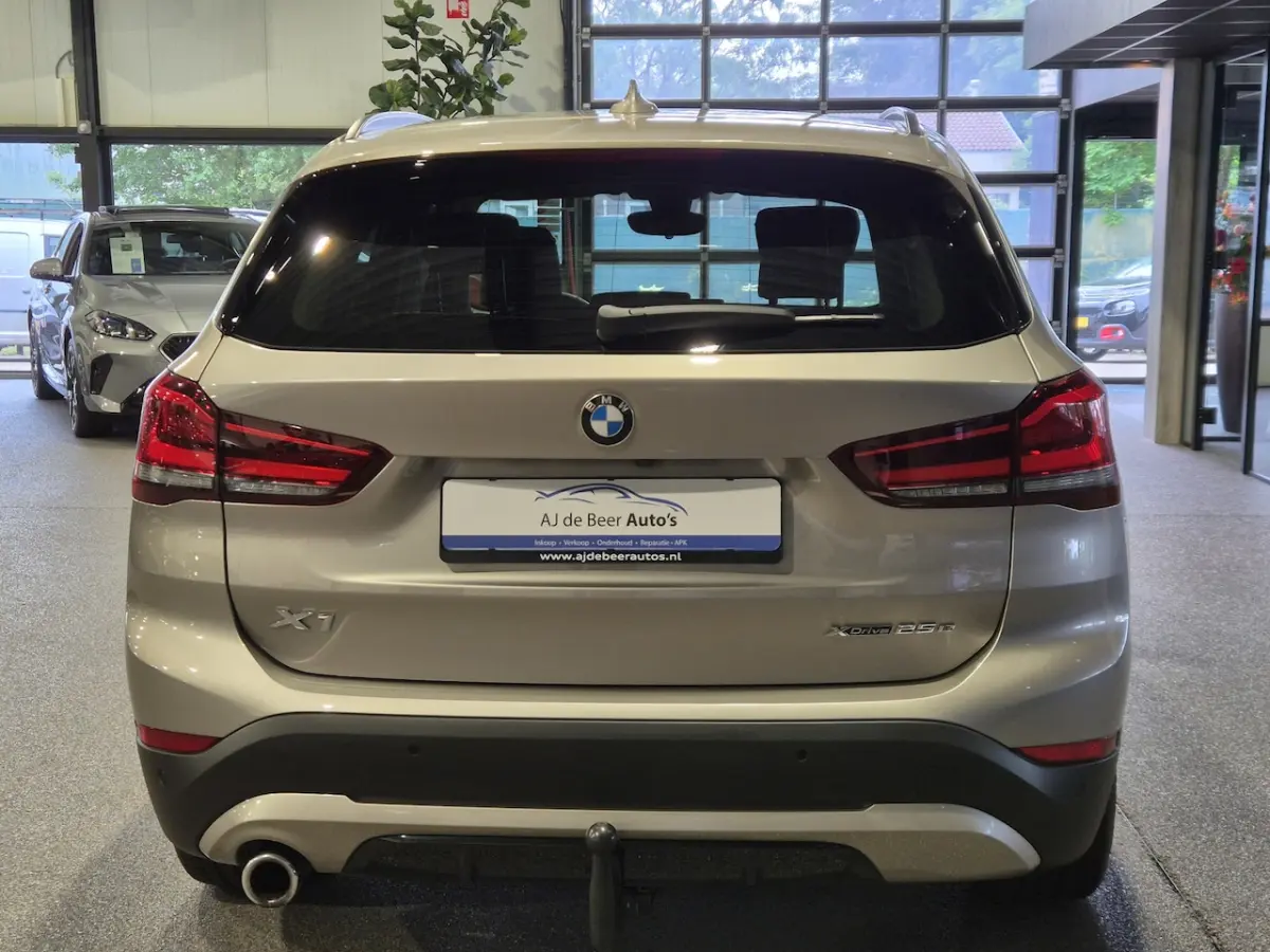 xDrive25e High Executive Sportline | Bruin leder | Camera | HUD | Trekhaak | 4x4