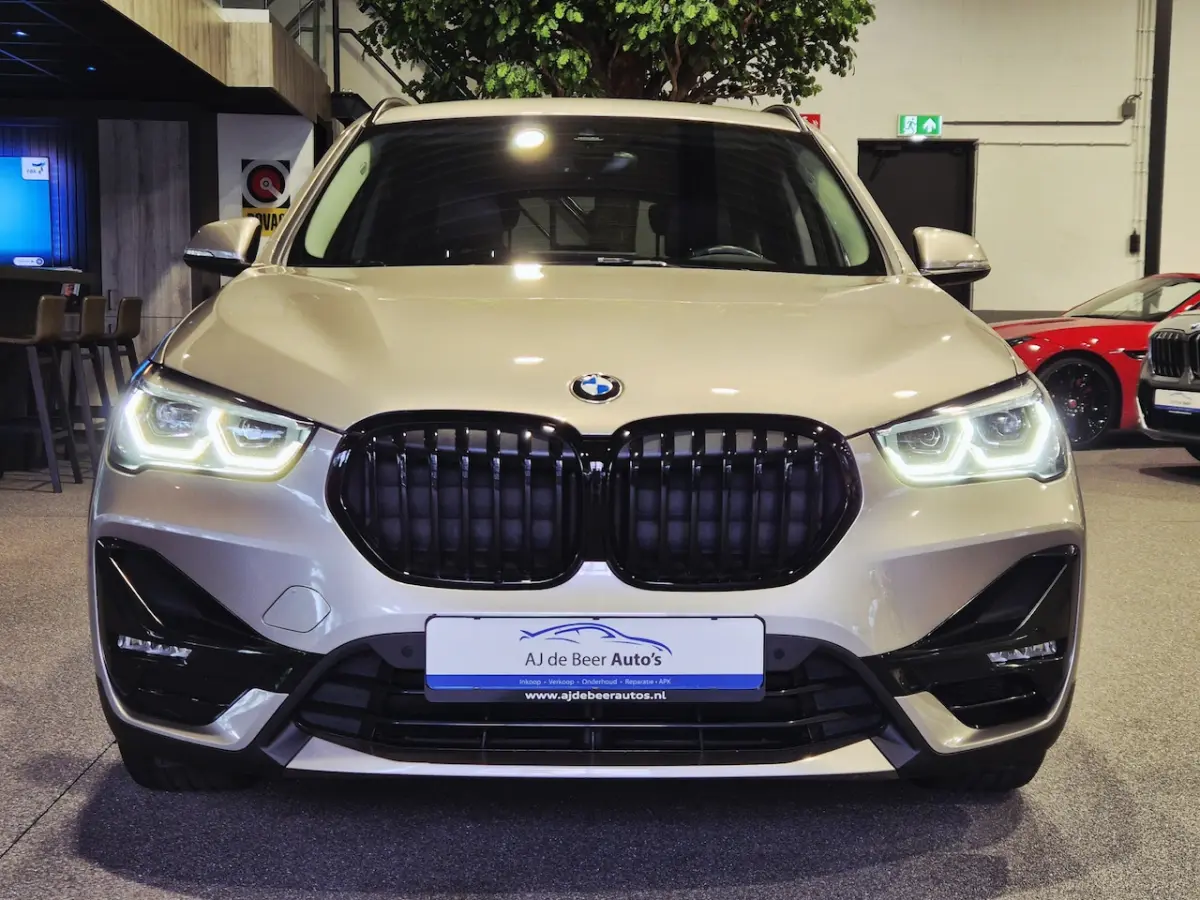 xDrive25e High Executive Sportline | Bruin leder | Camera | HUD | Trekhaak | 4x4