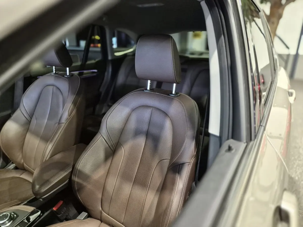xDrive25e High Executive Sportline | Bruin leder | Camera | HUD | Trekhaak | 4x4