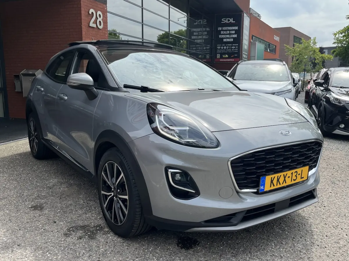 1.0 EcoBoost Hybrid Titanium X // PANO SCHUIF DAK // NAVI // PDC // STOEL + STUUR VERWARMI