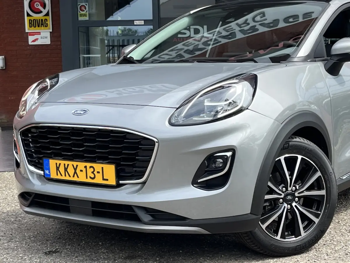 1.0 EcoBoost Hybrid Titanium X // PANO SCHUIF DAK // NAVI // PDC // STOEL + STUUR VERWARMI