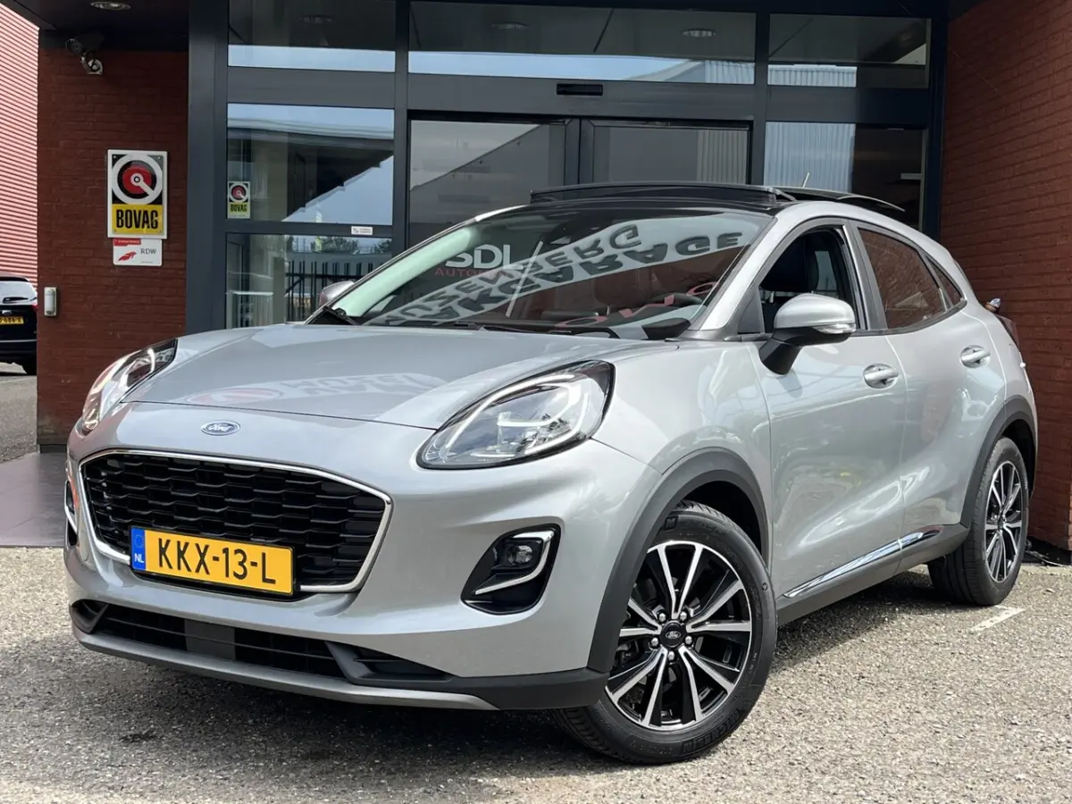 1.0 EcoBoost Hybrid Titanium X // PANO SCHUIF DAK // NAVI // PDC // STOEL + STUUR VERWARMI