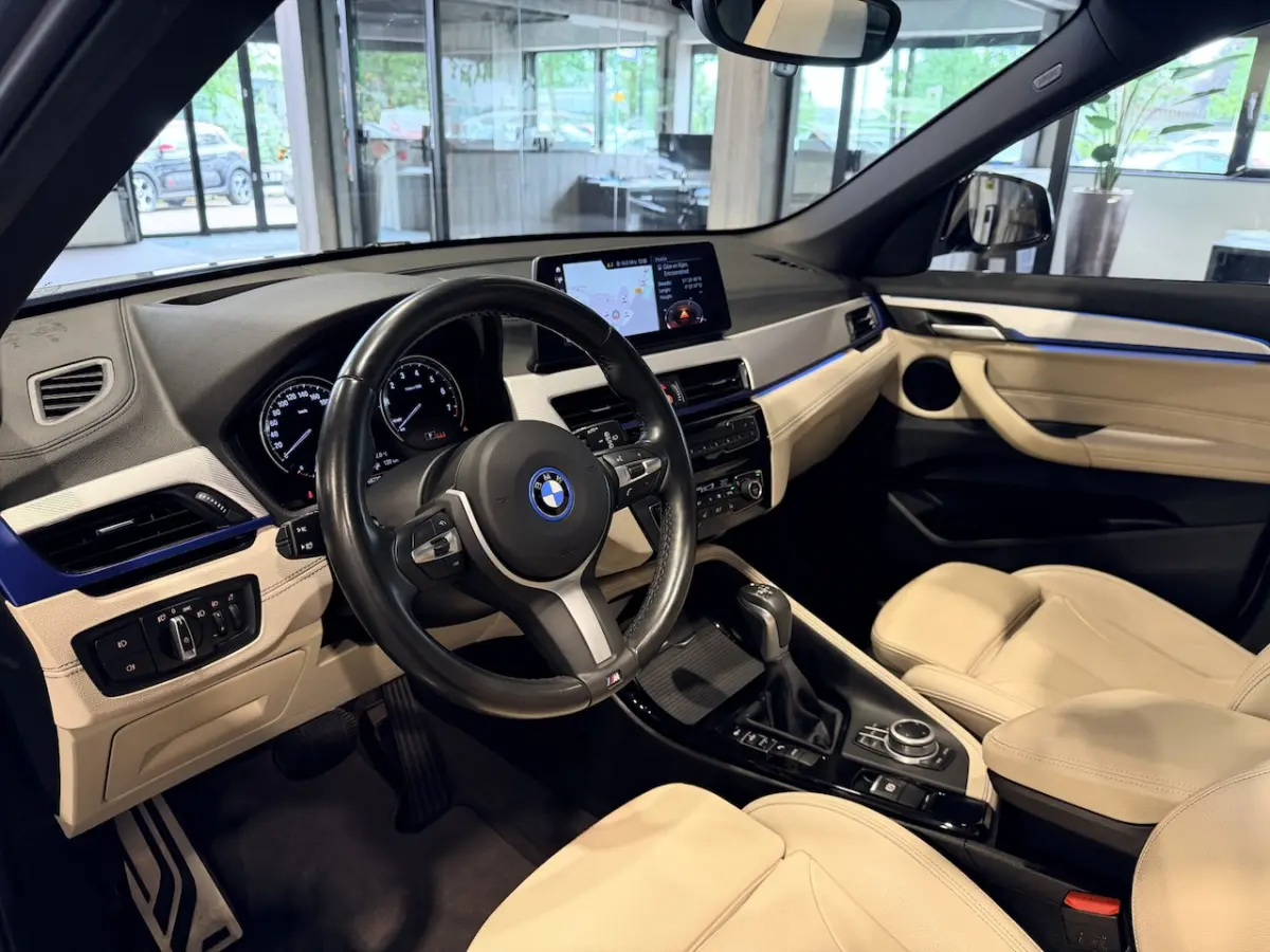 xDrive25e High Executive M-Sport | Panorama | CrÃ¨me leder | Camera | Navigatie Plus