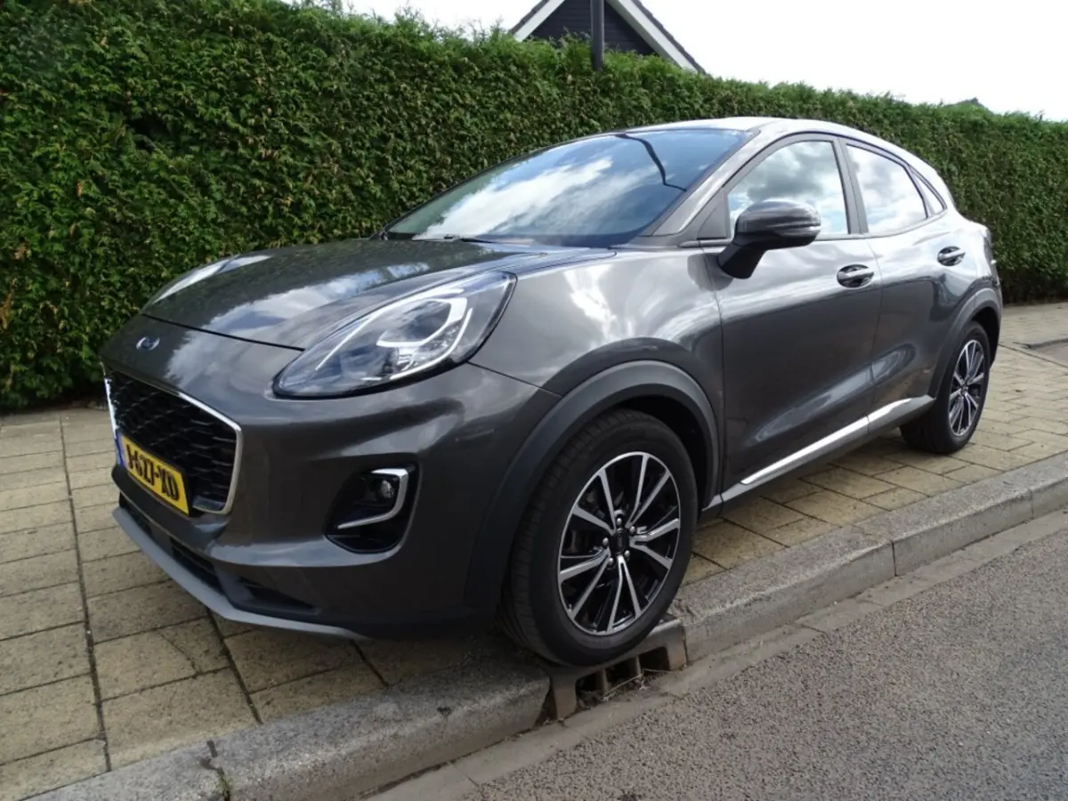 1.0 EB HYB. TITANIUM-Trkh-Carplay-Navi-Blth-Clima-Led