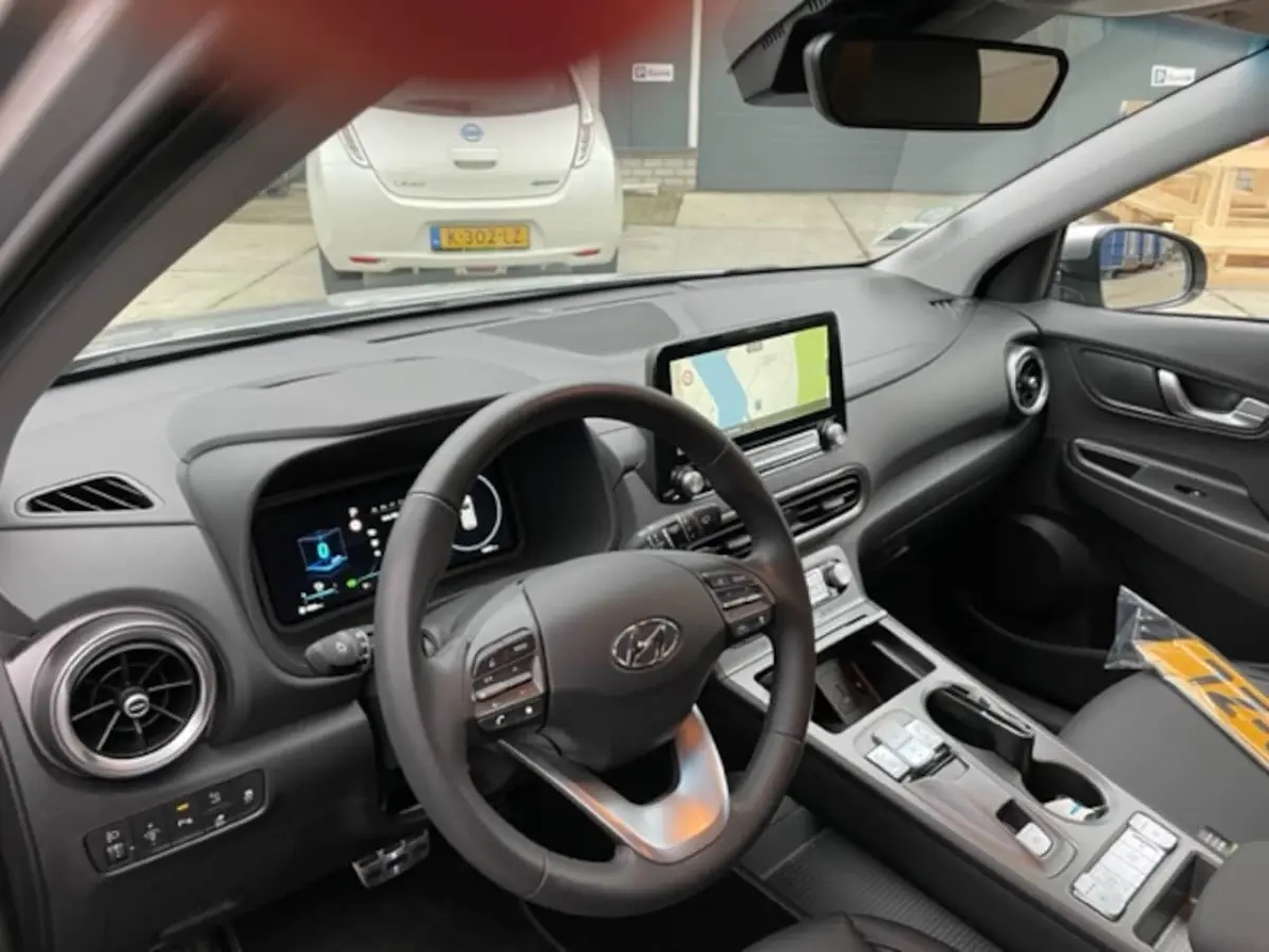 204 pk EV Premium Sky 64 kWh Auto is zo goed als nieuw