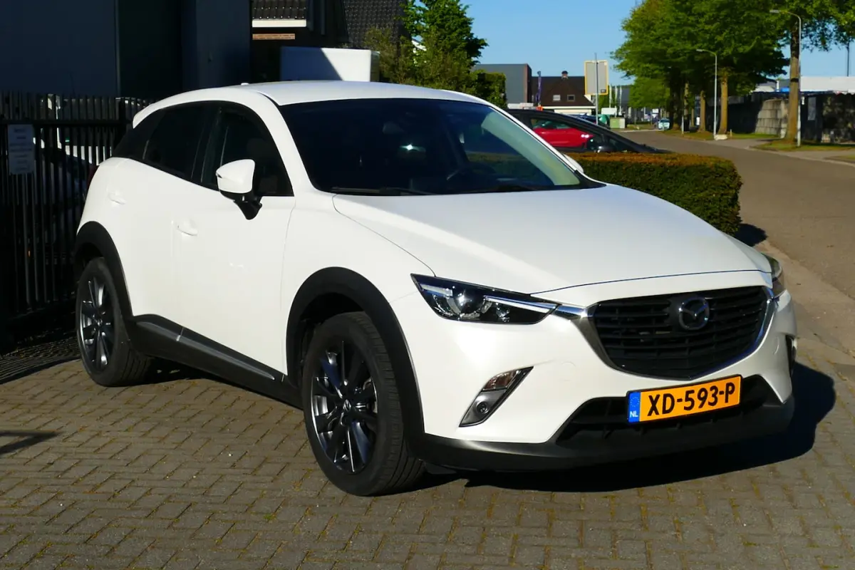 2.0 SkyActiv-G 120 GT-M Wit Metallic, Navi, Camera, Leer, StoelVerw, 18"LMV, Haak 1200kg