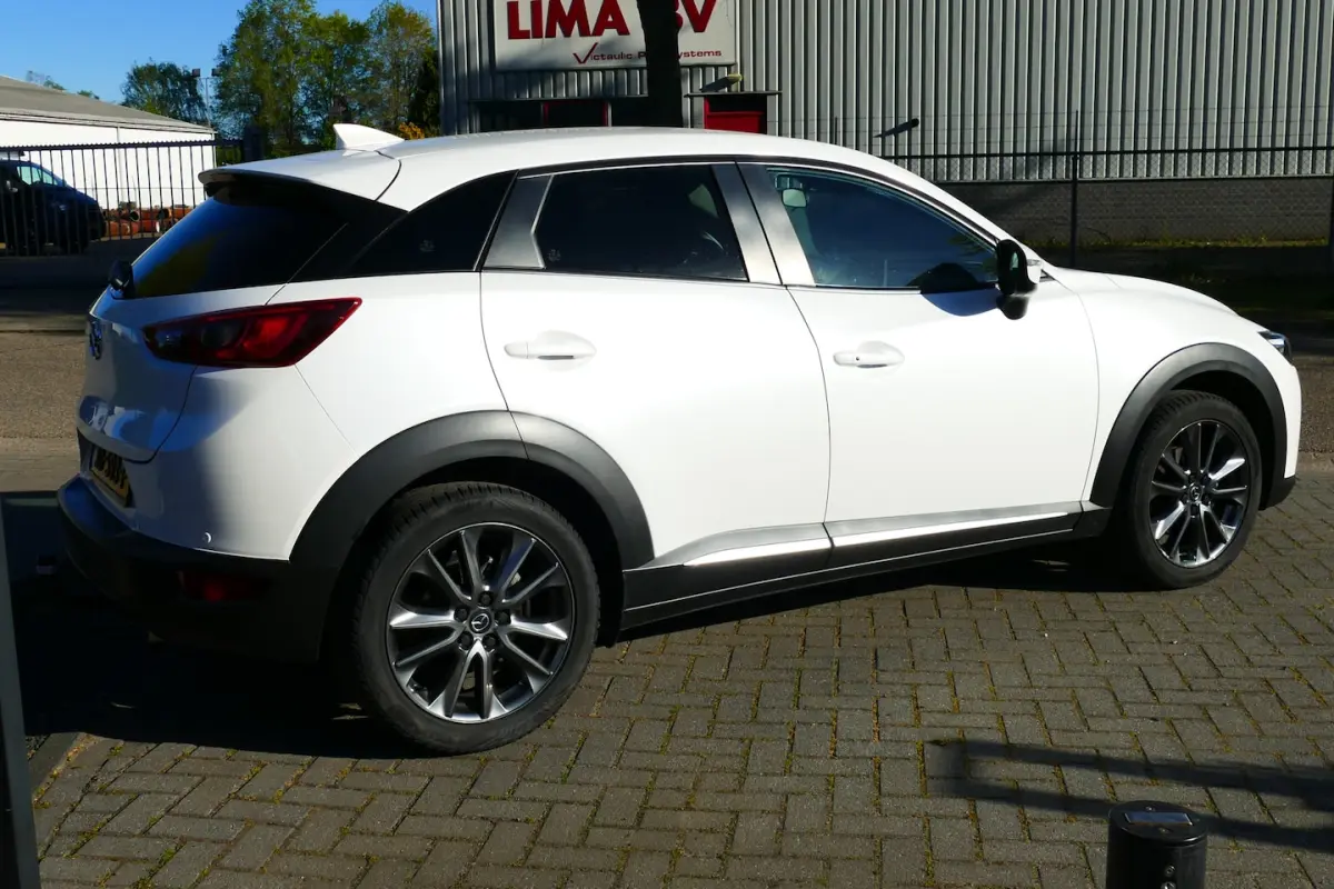 2.0 SkyActiv-G 120 GT-M Wit Metallic, Navi, Camera, Leer, StoelVerw, 18"LMV, Haak 1200kg