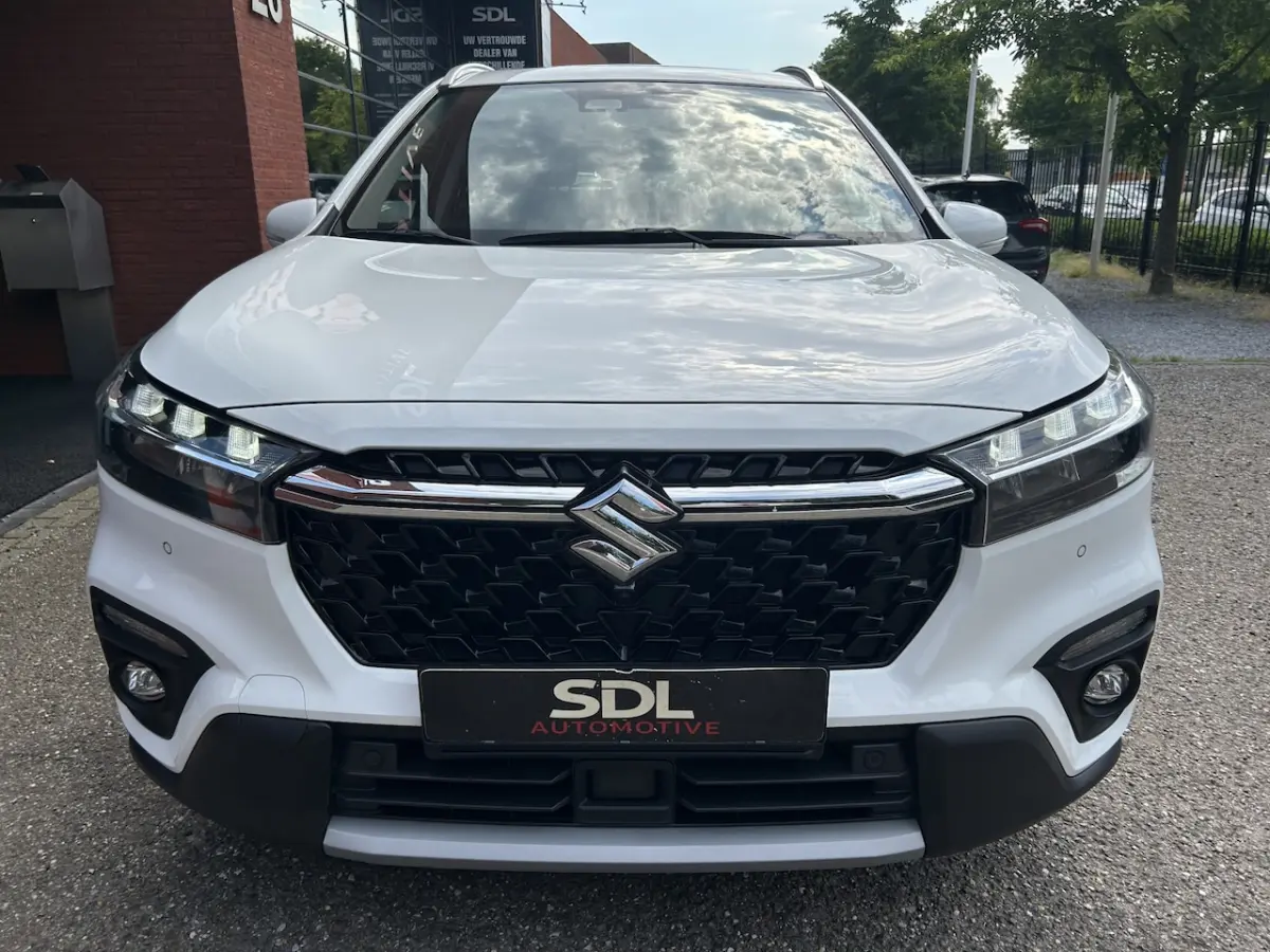 1.5 Hybrid Style // FULL LED // PANO/SCHUIFKANTELDAK // HALF-LEDER // NAVI + CARPLAY // KE