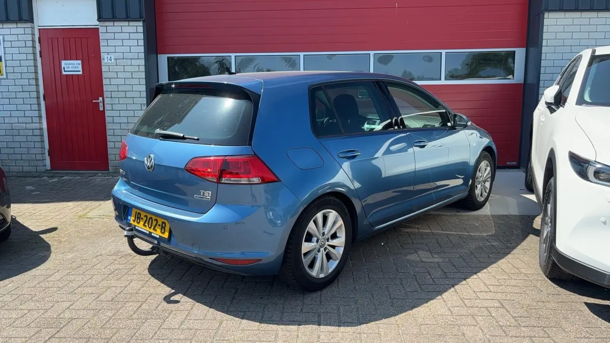 1.0 TSI Business Edition Connected TREKHAAK / CAMERA / NAVI / CLIMA / PDC / BLUETOOTH / CR