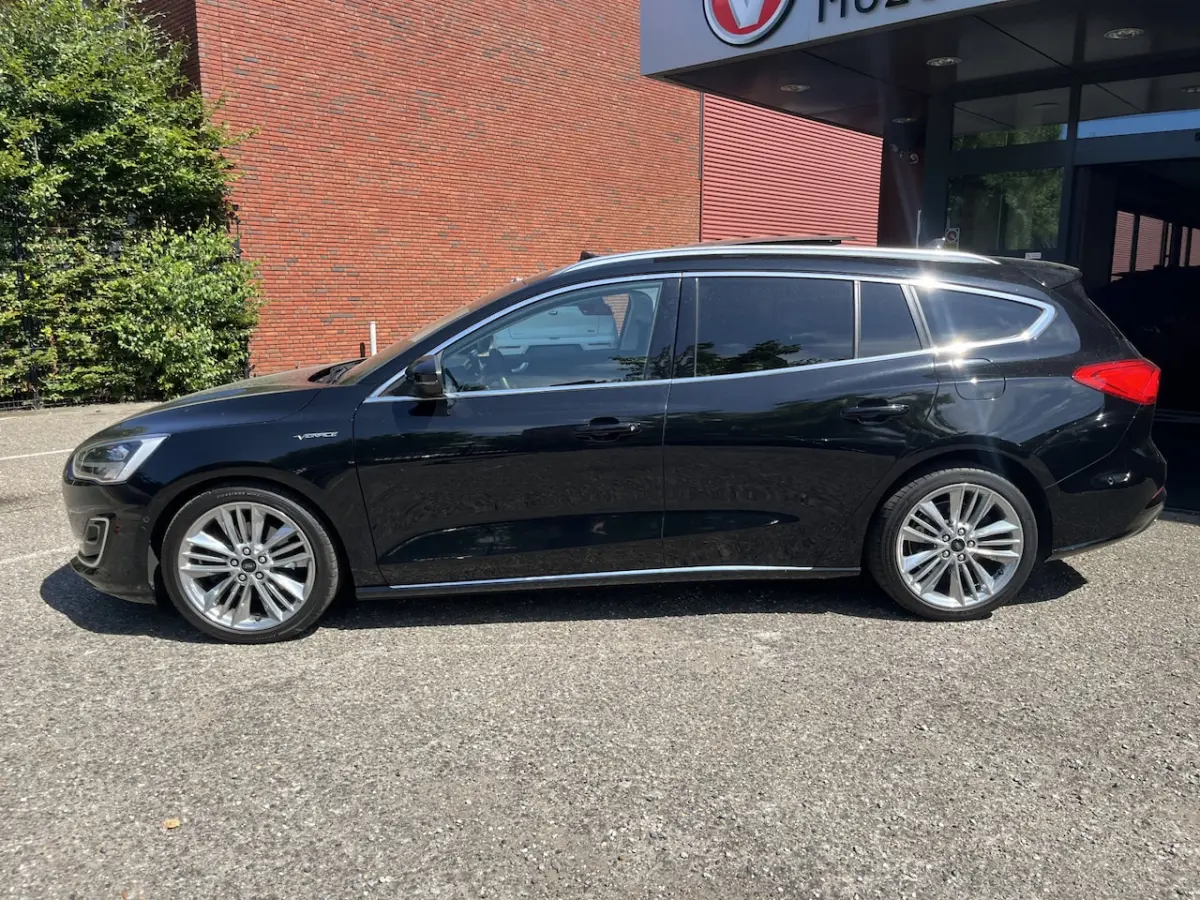 1.5 EcoBoost Vignale // LEDER+ELEK STOEL // SCHUIF-KANTELDAK // HEAD-UP DISPLAY // B&O SOU