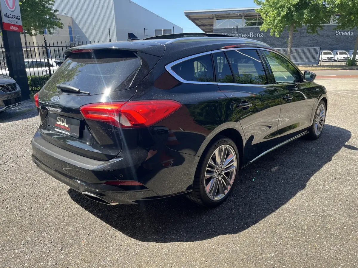 1.5 EcoBoost Vignale // LEDER+ELEK STOEL // SCHUIF-KANTELDAK // HEAD-UP DISPLAY // B&O SOU