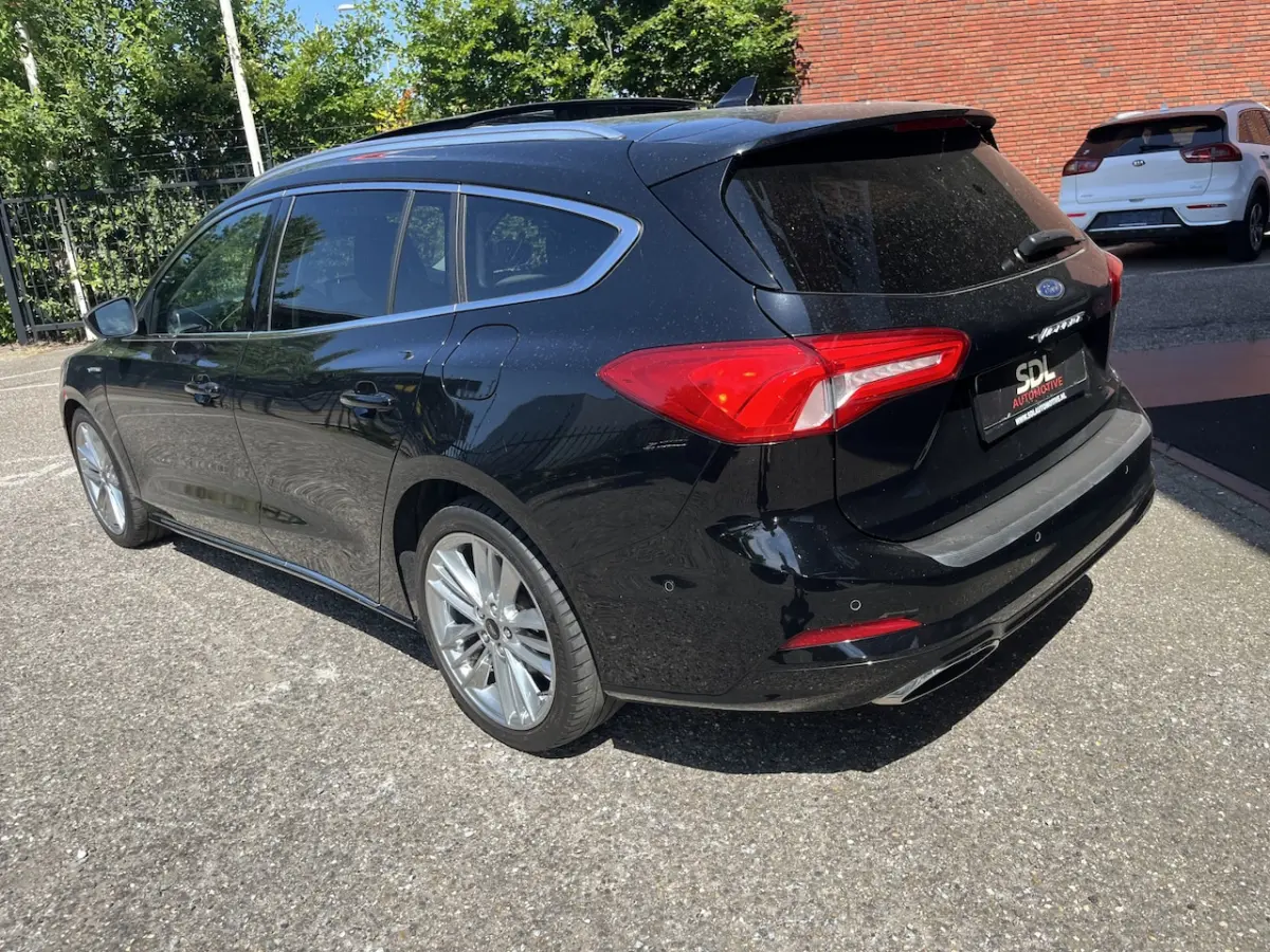 1.5 EcoBoost Vignale // LEDER+ELEK STOEL // SCHUIF-KANTELDAK // HEAD-UP DISPLAY // B&O SOU