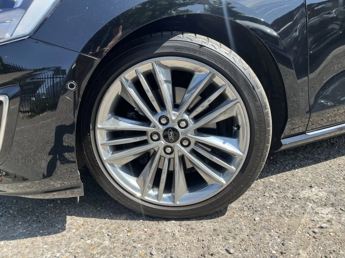 1.5 EcoBoost Vignale // LEDER+ELEK STOEL // SCHUIF-KANTELDAK // HEAD-UP DISPLAY // B&O SOU