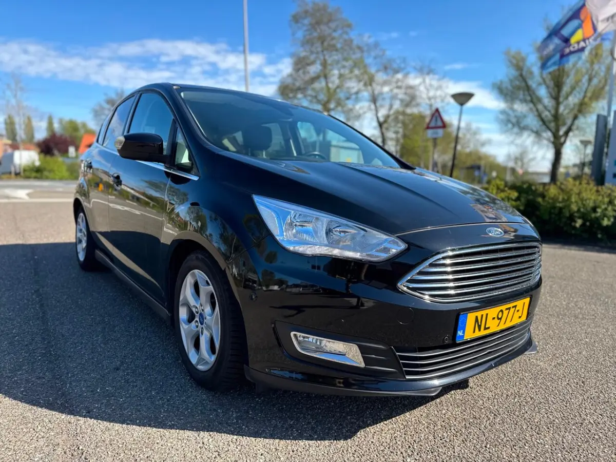 1.0 Titanium / 1e.eigenaar / distributie.vervangen / airco / cruise.cont. / navigatie / el