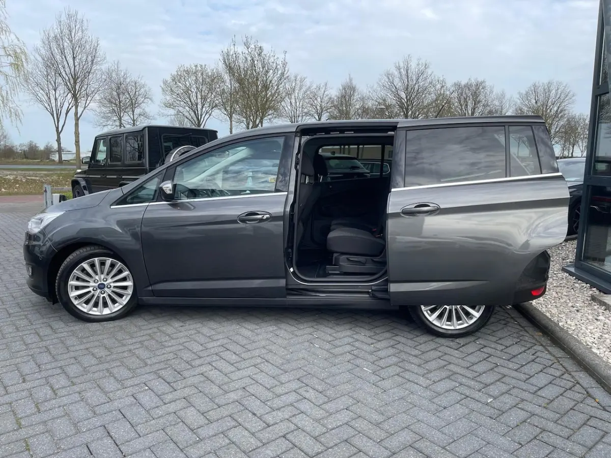 1.0 Titanium | 7 Persoons | Schuifdeuren | PDC | LMV | Airco | Cruise | Navi | ORG NL |