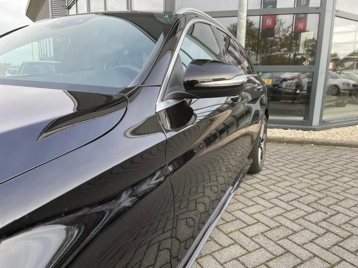 180 Business Solution AMG | Autom 9G | ECC | Navi | Virtueel Cockpit | Leer | PDC | Camera
