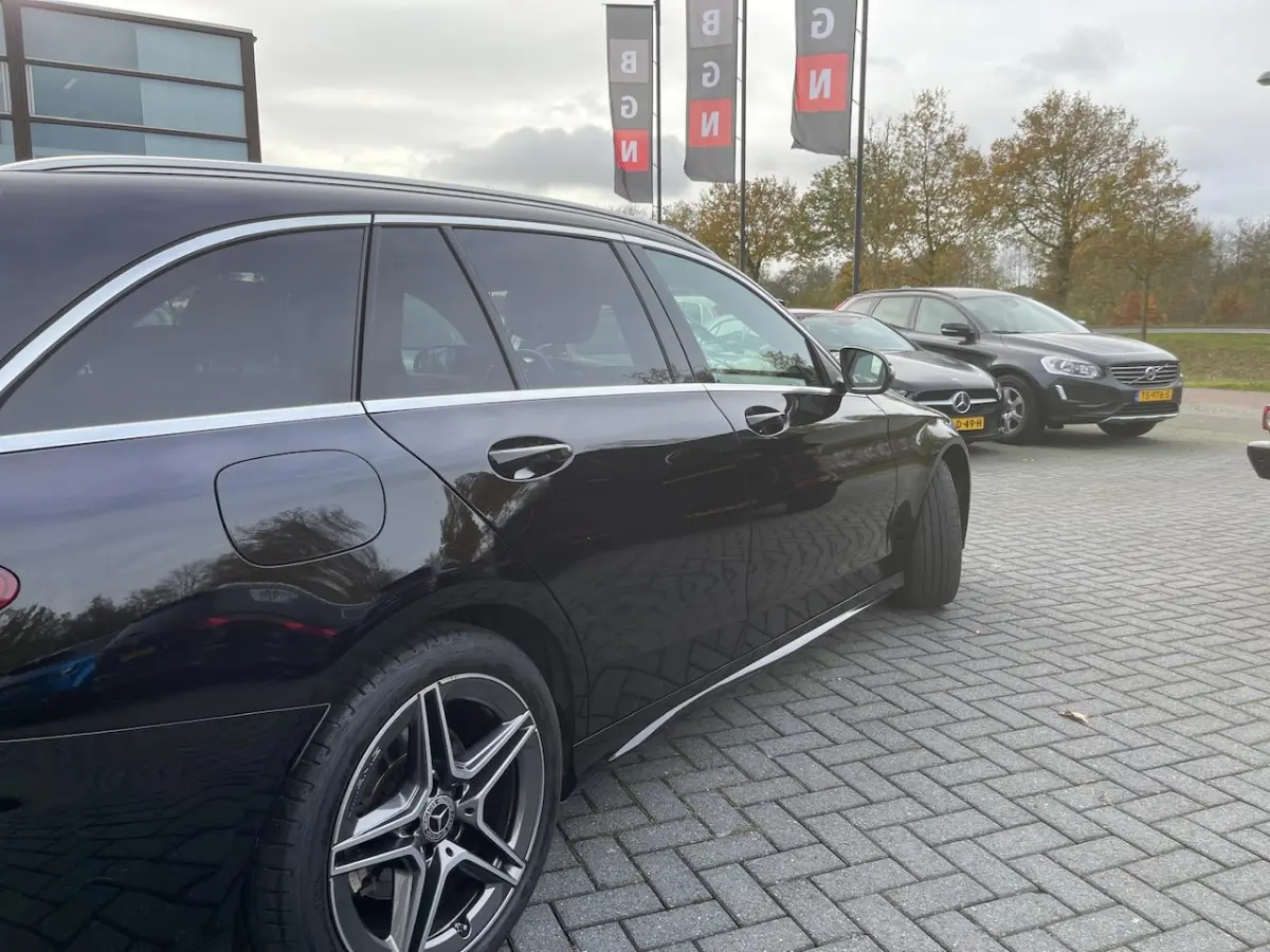 180 Business Solution AMG | Autom 9G | ECC | Navi | Virtueel Cockpit | Leer | PDC | Camera