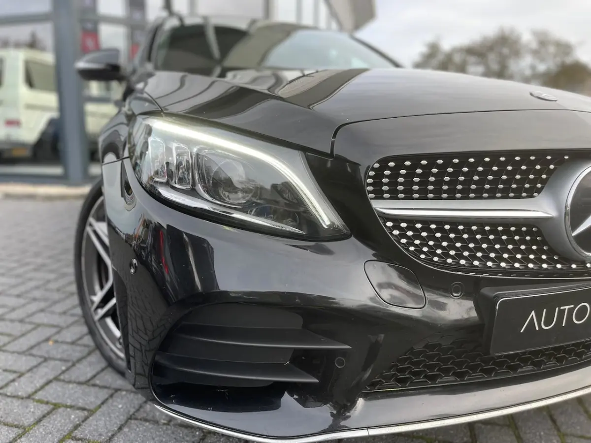 180 Business Solution AMG | Autom 9G | ECC | Navi | Virtueel Cockpit | Leer | PDC | Camera