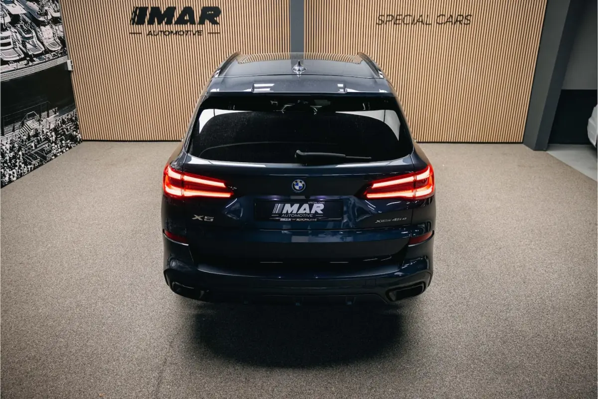 xDrive45e High Executive | M-sport | Luchtvering | Pano | Head-Up | Trekhaak | 360 camera