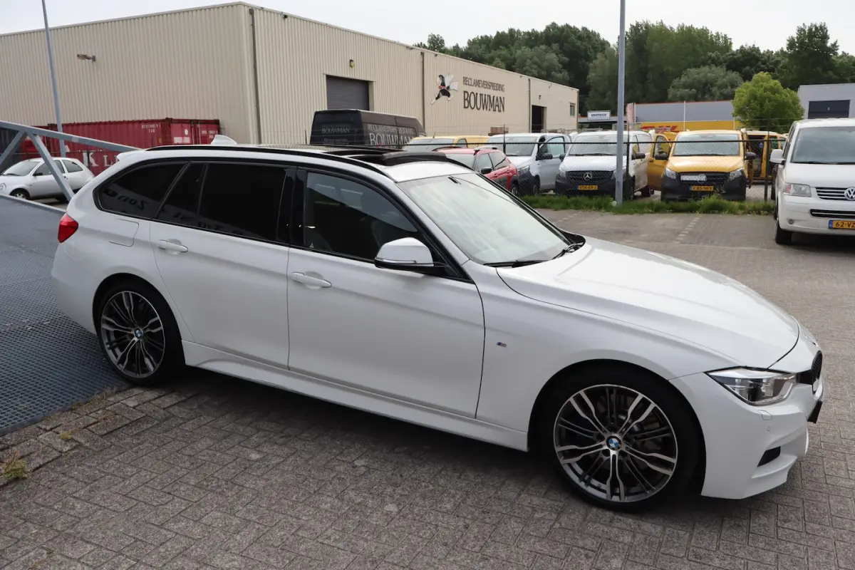 340i xDrive Centennial High Executive M Sport Panoramadak/Achteruitrijcamera/Head-up displ