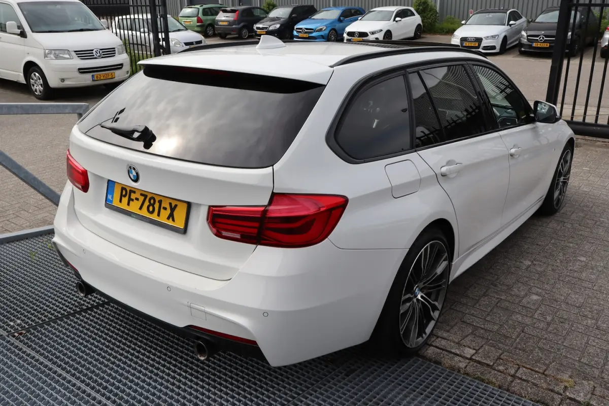 340i xDrive Centennial High Executive M Sport Panoramadak/Achteruitrijcamera/Head-up displ