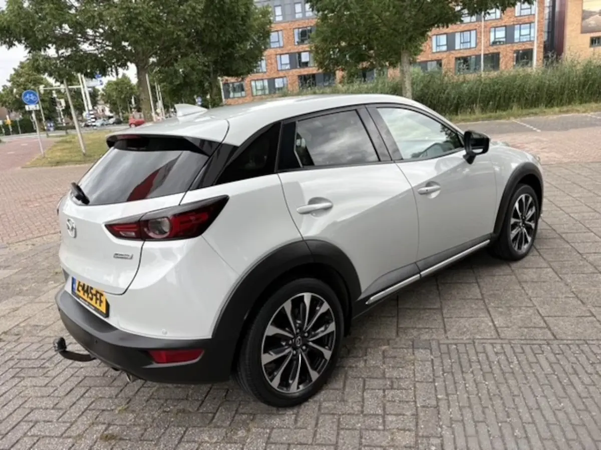 2.0 SkyActiv-G 120 GT-M | Navi | Leer | Trekhaak | 52.940 km Dealeronderhouden