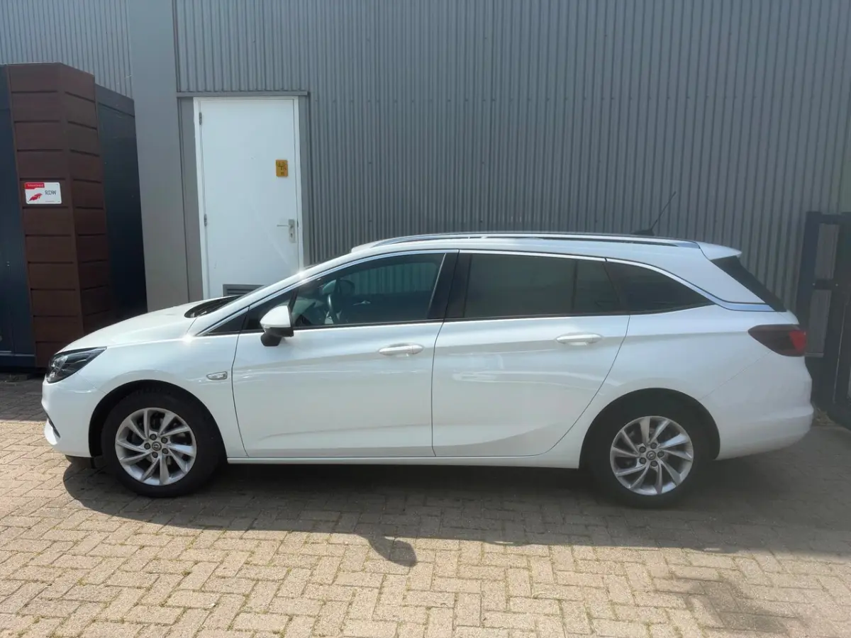 1.2 Business Elegance / 1E EIGENAAR / TREKHAAK / CAMERA / NAVIGATIE / AIRCO / CRUISE CONTR