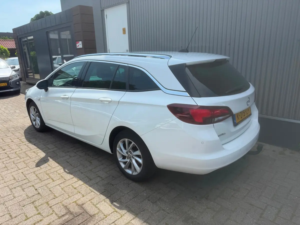 1.2 Business Elegance / 1E EIGENAAR / TREKHAAK / CAMERA / NAVIGATIE / AIRCO / CRUISE CONTR