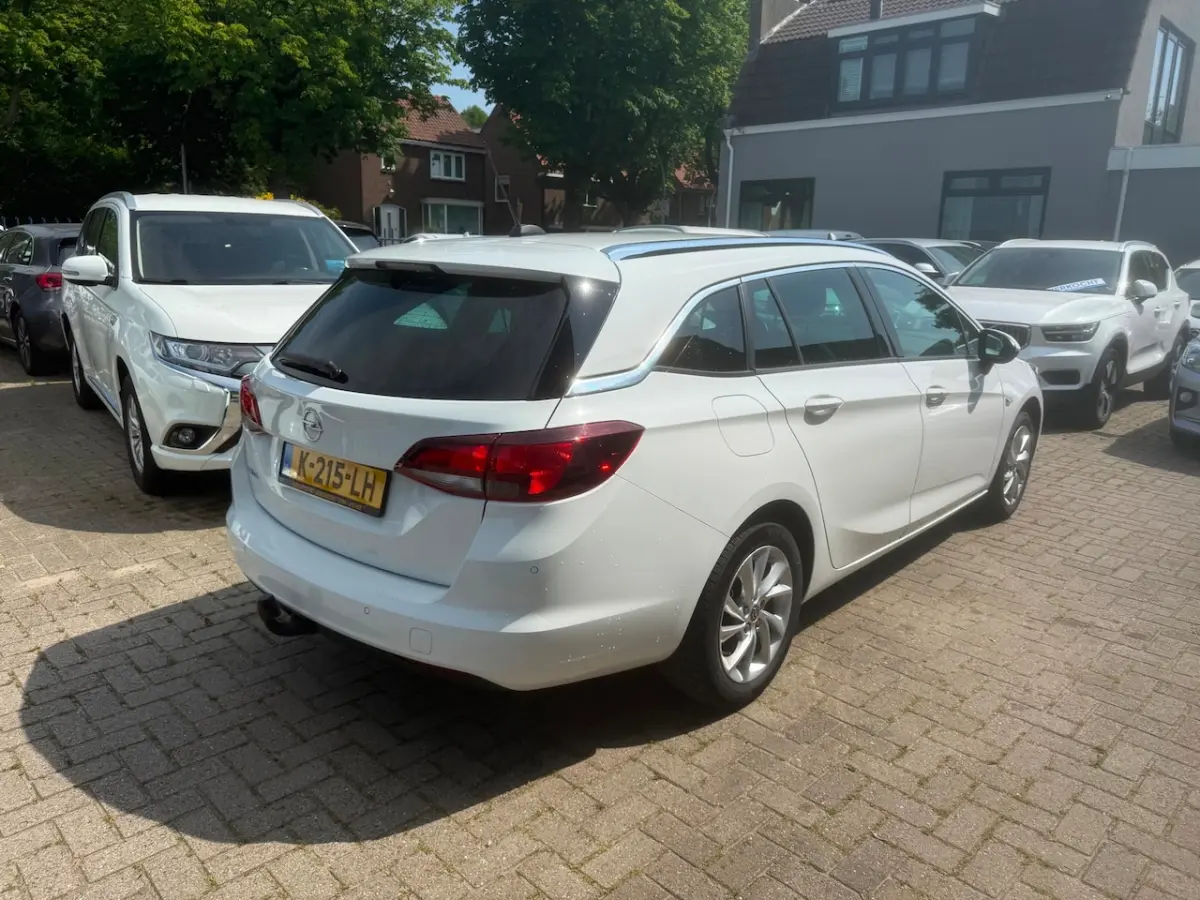 1.2 Business Elegance / 1E EIGENAAR / TREKHAAK / CAMERA / NAVIGATIE / AIRCO / CRUISE CONTR