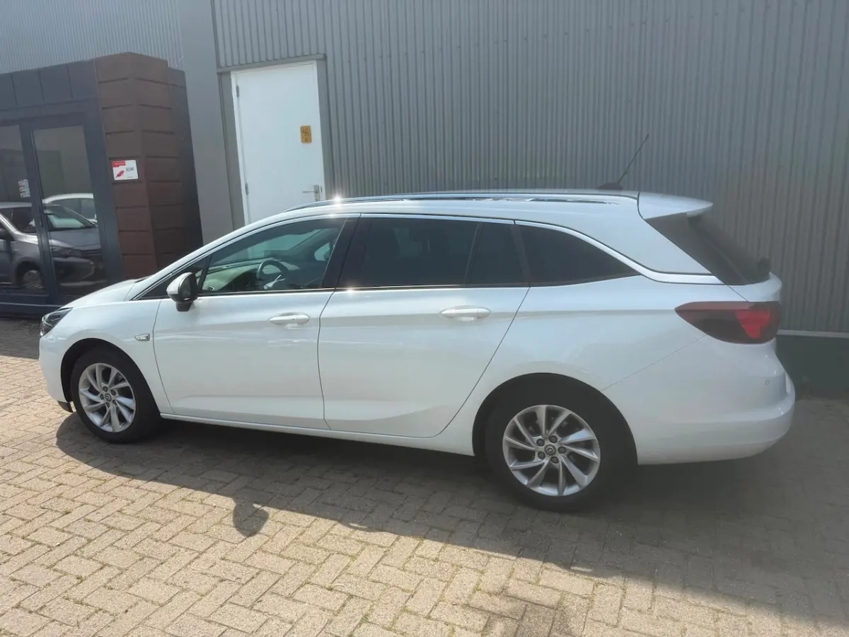 1.2 Business Elegance / 1E EIGENAAR / TREKHAAK / CAMERA / NAVIGATIE / AIRCO / CRUISE CONTR