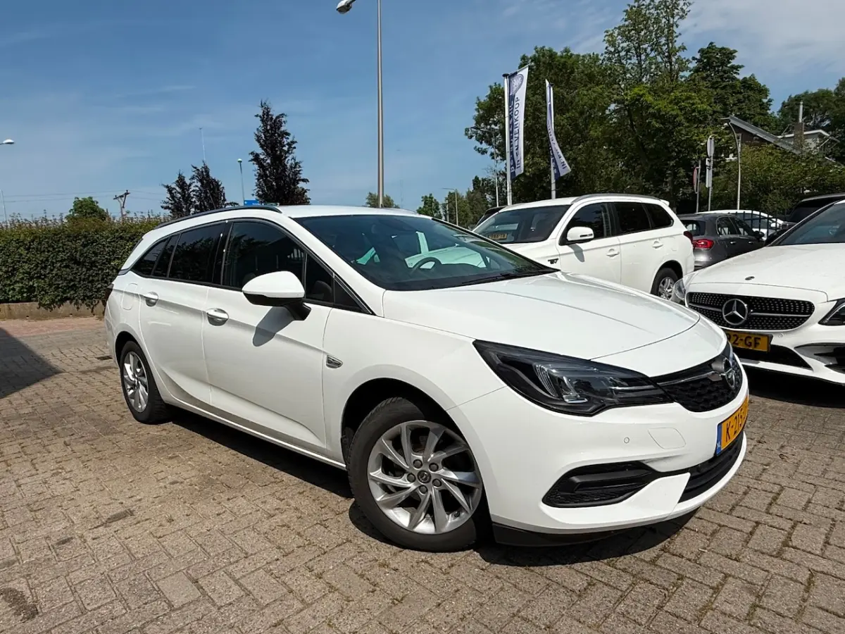 1.2 Business Elegance / 1E EIGENAAR / TREKHAAK / CAMERA / NAVIGATIE / AIRCO / CRUISE CONTR