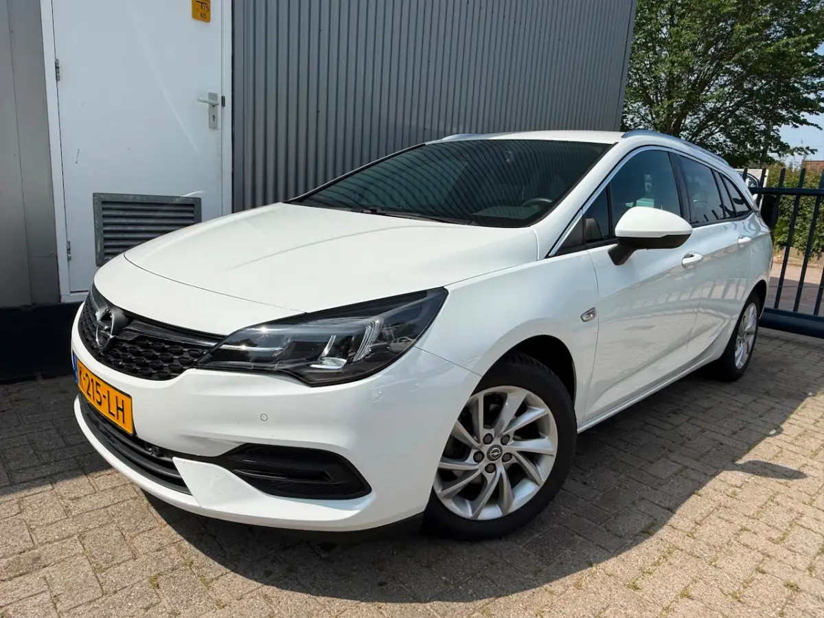 1.2 Business Elegance / 1E EIGENAAR / TREKHAAK / CAMERA / NAVIGATIE / AIRCO / CRUISE CONTR