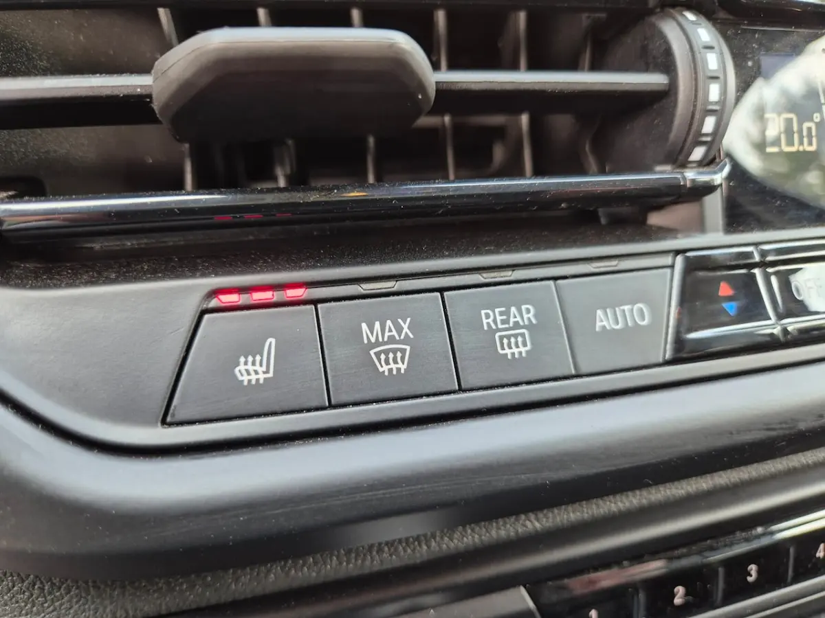 118i - Panoramadak - Memorystoel - Stoelverwarming - Adapt Cruise - Camera - CarPlay - Inc