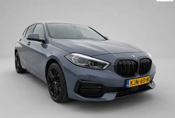 118i - Panoramadak - Memorystoel - Stoelverwarming - Adapt Cruise - Camera - CarPlay - Inc